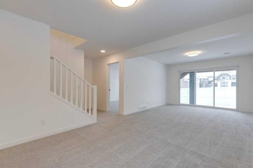 1402 Bayview Crescent Sw, Airdrie, AB - Indoor Photo Showing Other Room
