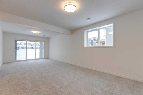 1402 Bayview Crescent Sw, Airdrie, AB - Indoor Photo Showing Other Room