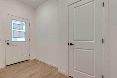1402 Bayview Crescent Sw, Airdrie, AB - Indoor Photo Showing Other Room