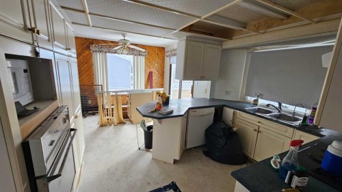 5006 Alexander Avenue, Coronation, AB - Indoor Photo Showing Kitchen With Double Sink