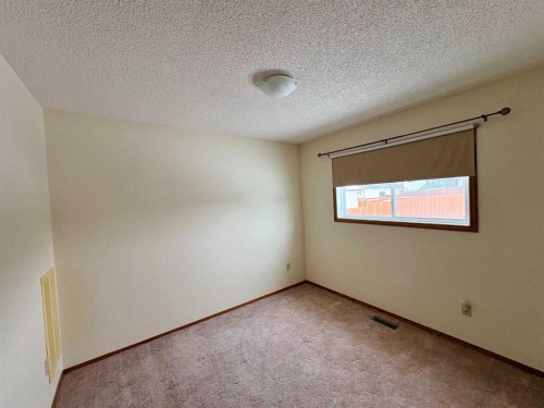 4304 56 Avenue, Innisfail, AB - Indoor Photo Showing Other Room