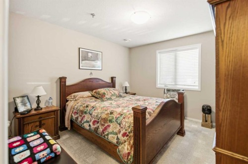 106-5205 Woodland Road, Innisfail, AB - Indoor Photo Showing Bedroom