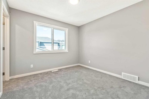 112 Key Cove Sw, Airdrie, AB - Indoor Photo Showing Other Room