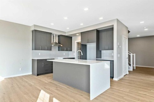 112 Key Cove Sw, Airdrie, AB - Indoor Photo Showing Kitchen With Upgraded Kitchen