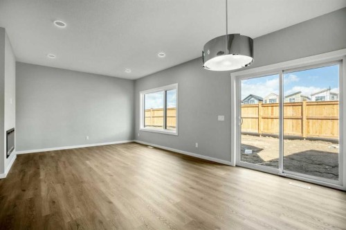 11 Heritage Link, Cochrane, AB - Indoor Photo Showing Other Room
