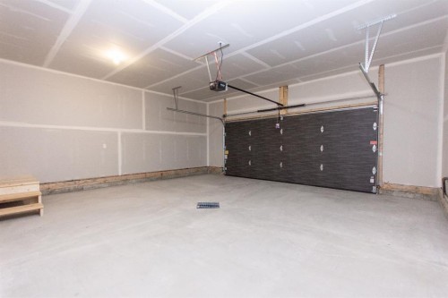 49 Turnbull Close, Red Deer, AB - Indoor Photo Showing Garage