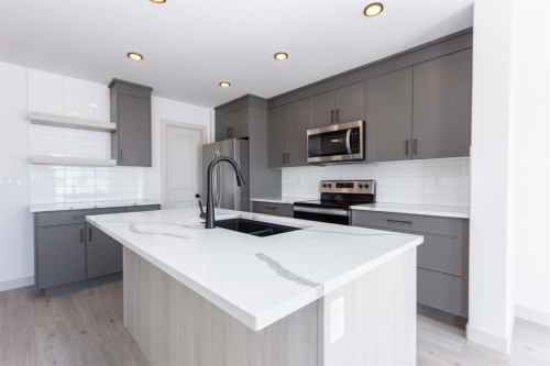 49 Turnbull Close, Red Deer, AB - Indoor Photo Showing Kitchen With Upgraded Kitchen