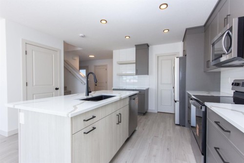 49 Turnbull Close, Red Deer, AB - Indoor Photo Showing Kitchen With Upgraded Kitchen