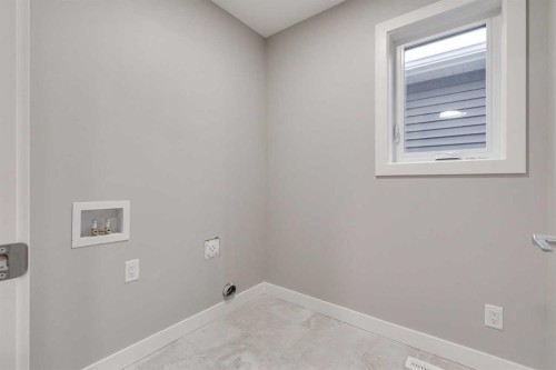 483 Hotchkiss Manor Se, Calgary, AB - Indoor Photo Showing Other Room