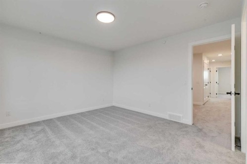 479 Hotchkiss Manor Se, Calgary, AB - Indoor Photo Showing Other Room