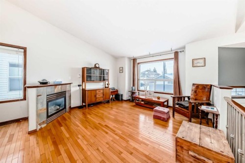 47 Lougheed Close, Red Deer, AB - Indoor Photo Showing Living Room With Fireplace