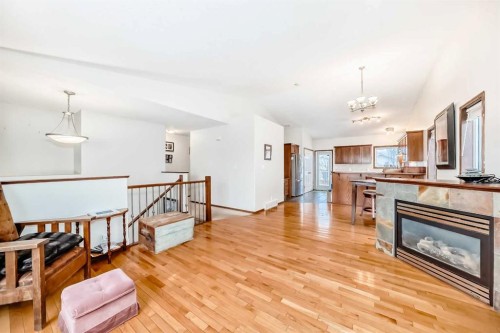 47 Lougheed Close, Red Deer, AB - Indoor Photo Showing Living Room With Fireplace