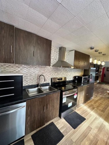 5302 50 Street, Camrose, AB - Indoor Photo Showing Kitchen With Double Sink