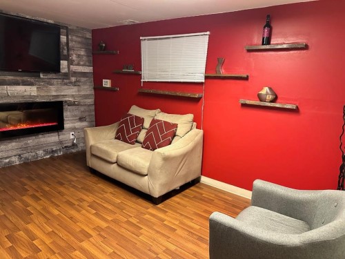 5302 50 Street, Camrose, AB - Indoor With Fireplace