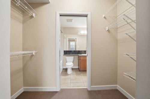 207-100 Lakeway Boulevard, Sylvan Lake, AB - Indoor With Storage