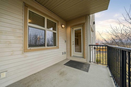 207-100 Lakeway Boulevard, Sylvan Lake, AB - Outdoor With Deck Patio Veranda With Exterior