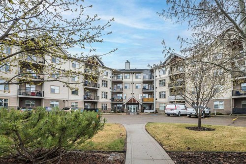 207-100 Lakeway Boulevard, Sylvan Lake, AB - Outdoor With Facade