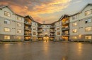 207-100 Lakeway Boulevard, Sylvan Lake, AB  - Outdoor With Facade 