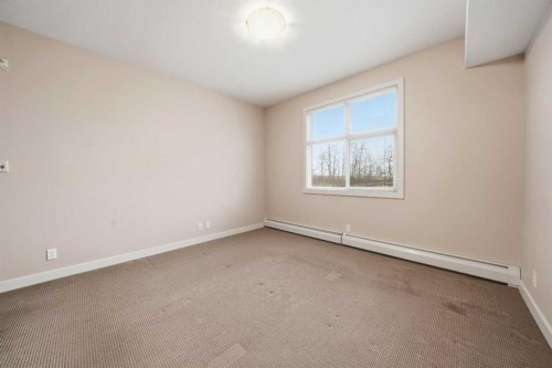 207-100 Lakeway Boulevard, Sylvan Lake, AB - Indoor Photo Showing Other Room