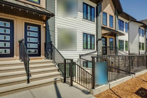 105-40 Livingston Parade Ne, Calgary, AB - Outdoor With Facade