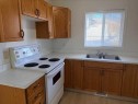 B-5915 52 Avenue, Red Deer, AB  - Indoor Photo Showing Kitchen With Double Sink 