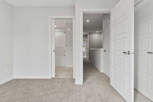 106-40 Livingston Parade Ne, Calgary, AB - Indoor Photo Showing Other Room