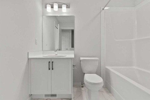 106-40 Livingston Parade Ne, Calgary, AB - Indoor Photo Showing Bathroom