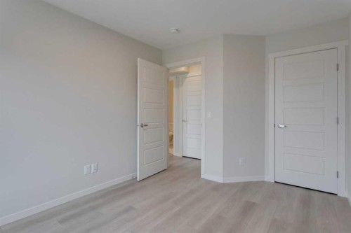 215-40 Livingston Parade Ne, Calgary, AB - Indoor Photo Showing Other Room