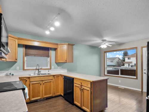 109 Duckering Close, Red Deer, AB - Indoor Photo Showing Kitchen With Double Sink