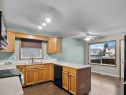 109 Duckering Close, Red Deer, AB  - Indoor Photo Showing Kitchen With Double Sink 