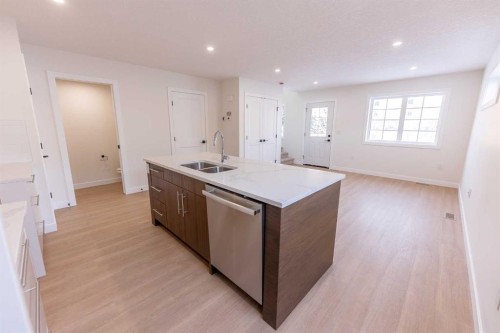 5139 48 Street, Innisfail, AB - Indoor Photo Showing Kitchen With Double Sink