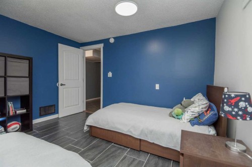 34 Wright Avenue, Red Deer, AB - Indoor Photo Showing Bedroom