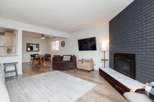 34 Wright Avenue, Red Deer, AB - Indoor Photo Showing Living Room With Fireplace