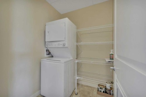 411-5110 36 Street, Red Deer, AB - Indoor Photo Showing Laundry Room