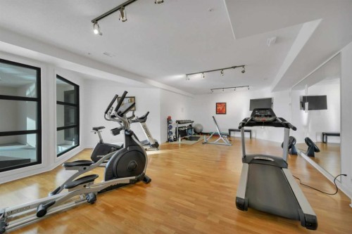 411-5110 36 Street, Red Deer, AB - Indoor Photo Showing Gym Room