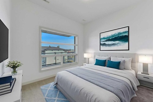 411-5110 36 Street, Red Deer, AB - Indoor Photo Showing Bedroom