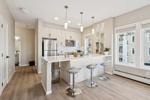 306-20 Mahogany Mews Se, Calgary, AB - Indoor Photo Showing Kitchen With Stainless Steel Kitchen With Upgraded Kitchen