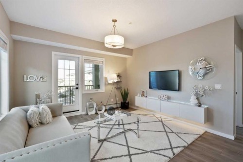 306-20 Mahogany Mews Se, Calgary, AB - Indoor Photo Showing Living Room