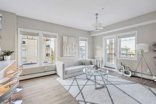 306-20 Mahogany Mews Se, Calgary, AB - Indoor Photo Showing Living Room