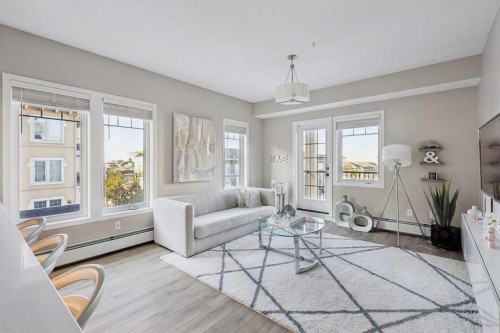 306-20 Mahogany Mews Se, Calgary, AB - Indoor Photo Showing Living Room