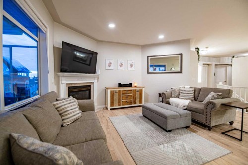 114 Alberts Close, Red Deer, AB - Indoor Photo Showing Living Room With Fireplace