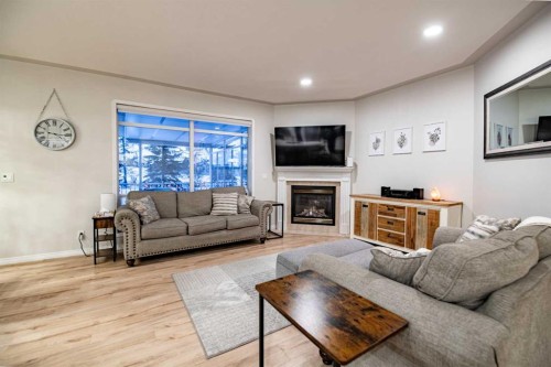 114 Alberts Close, Red Deer, AB - Indoor Photo Showing Living Room With Fireplace