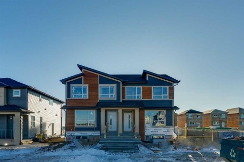 117 Bridgeport Gate Sw, Chestermere, AB - Outdoor With Facade