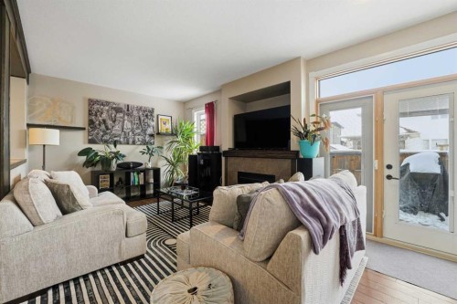 35 Windermere Close, Red Deer, AB - Indoor Photo Showing Living Room With Fireplace