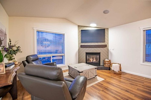 42 Landry Bend, Red Deer, AB - Indoor Photo Showing Living Room With Fireplace