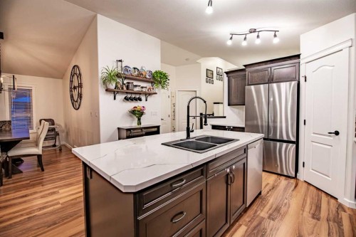 42 Landry Bend, Red Deer, AB - Indoor Photo Showing Kitchen With Stainless Steel Kitchen With Double Sink