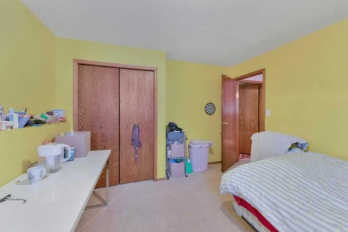 56 Dawson Street, Red Deer, AB - Indoor Photo Showing Bedroom