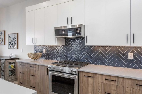 2 Twin Rose Court, Jarvis Bay, AB - Indoor Photo Showing Kitchen With Upgraded Kitchen