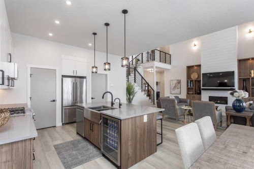 2 Twin Rose Court, Jarvis Bay, AB - Indoor Photo Showing Kitchen With Stainless Steel Kitchen With Double Sink With Upgraded Kitchen