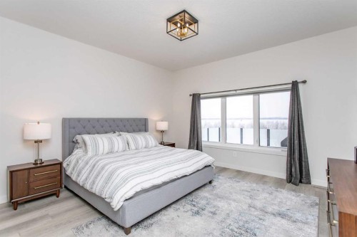2 Twin Rose Court, Jarvis Bay, AB - Indoor Photo Showing Bedroom